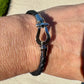 Leather bracelet with stainless steel horseshoe shackle