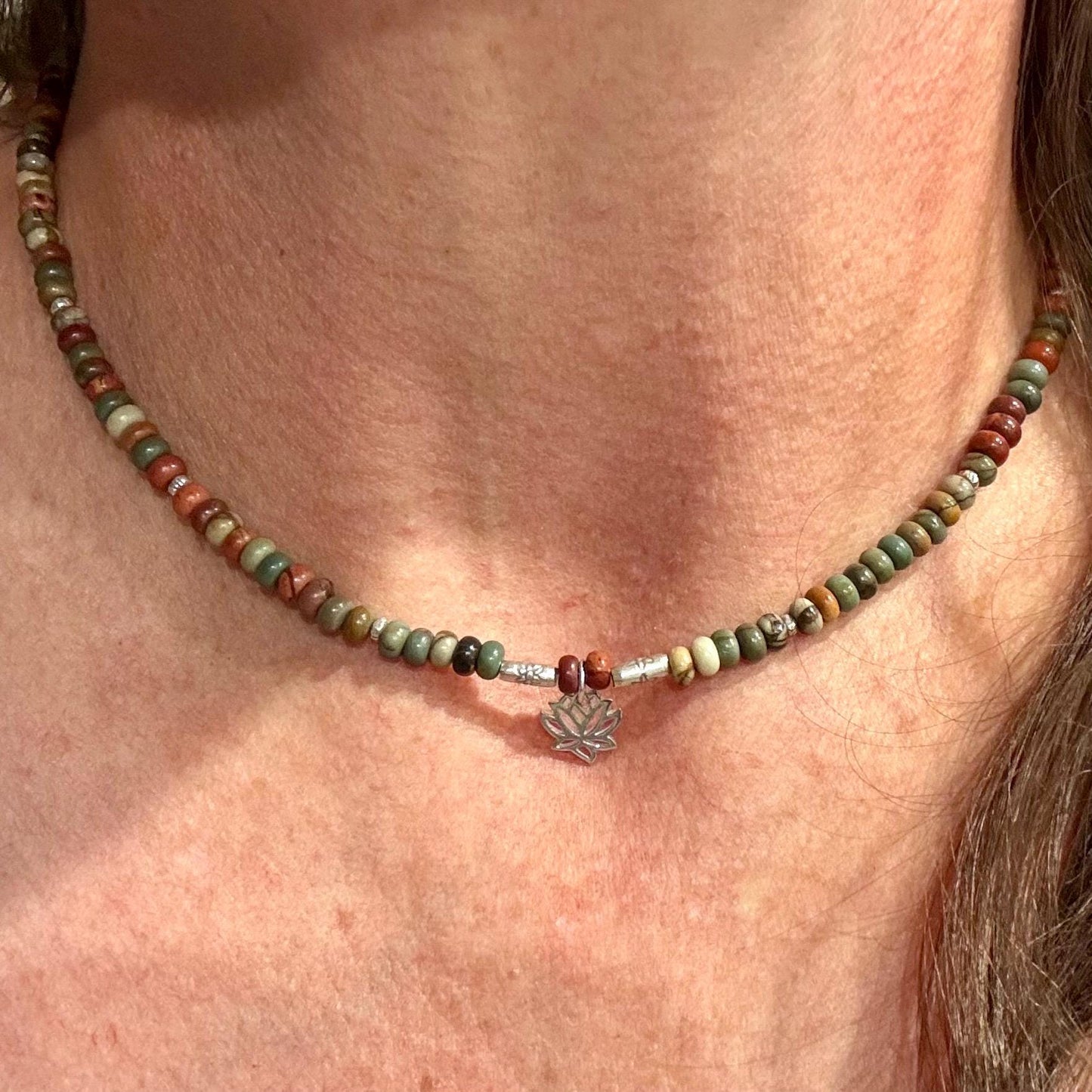 Picasso Red Creek Jasper gemstone necklace with sterling silver spacers and lotus flower pendant
