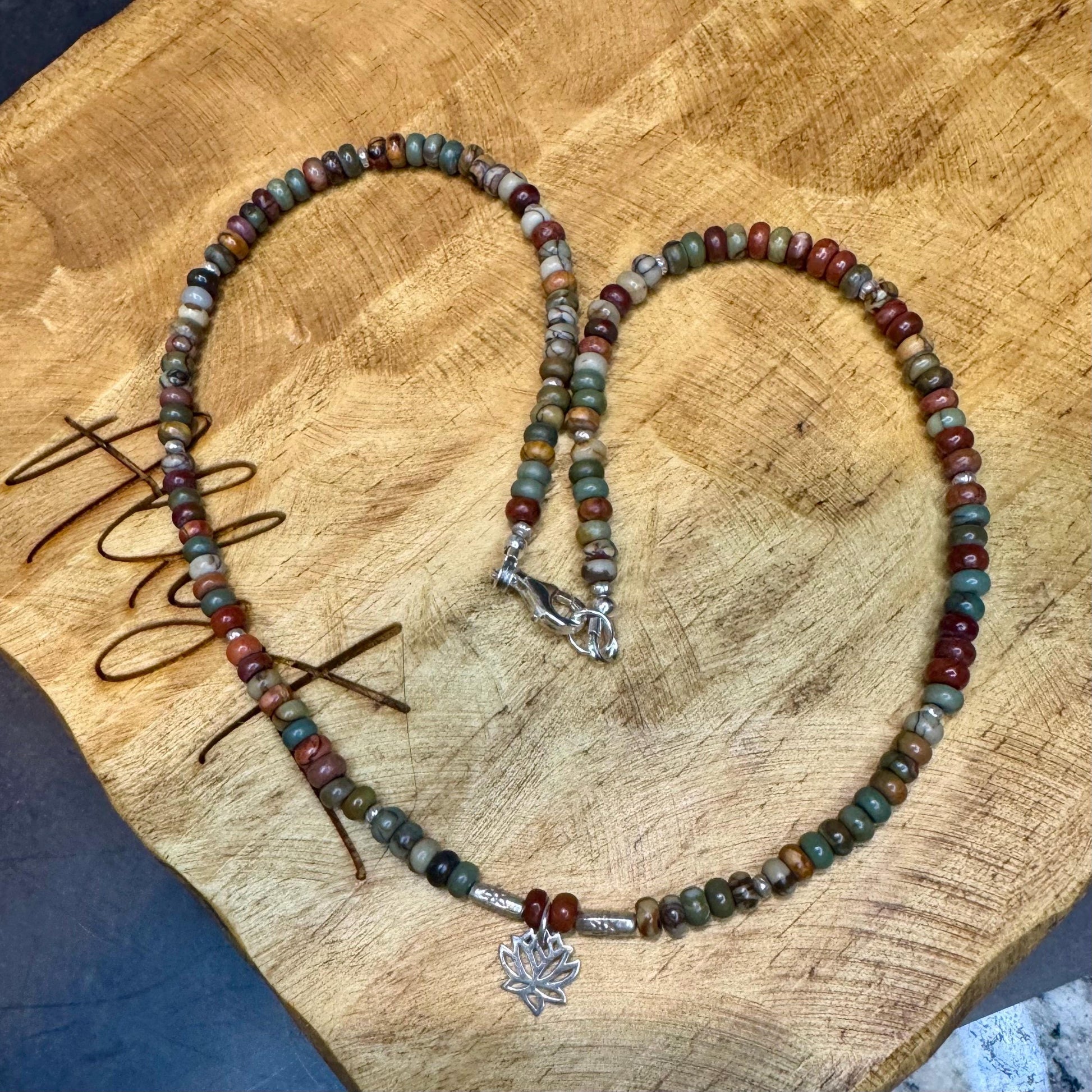 Picasso Red Creek Jasper gemstone necklace with sterling silver spacers and lotus flower pendant