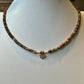 Picasso Red Creek Jasper gemstone necklace with sterling silver spacers and lotus flower pendant