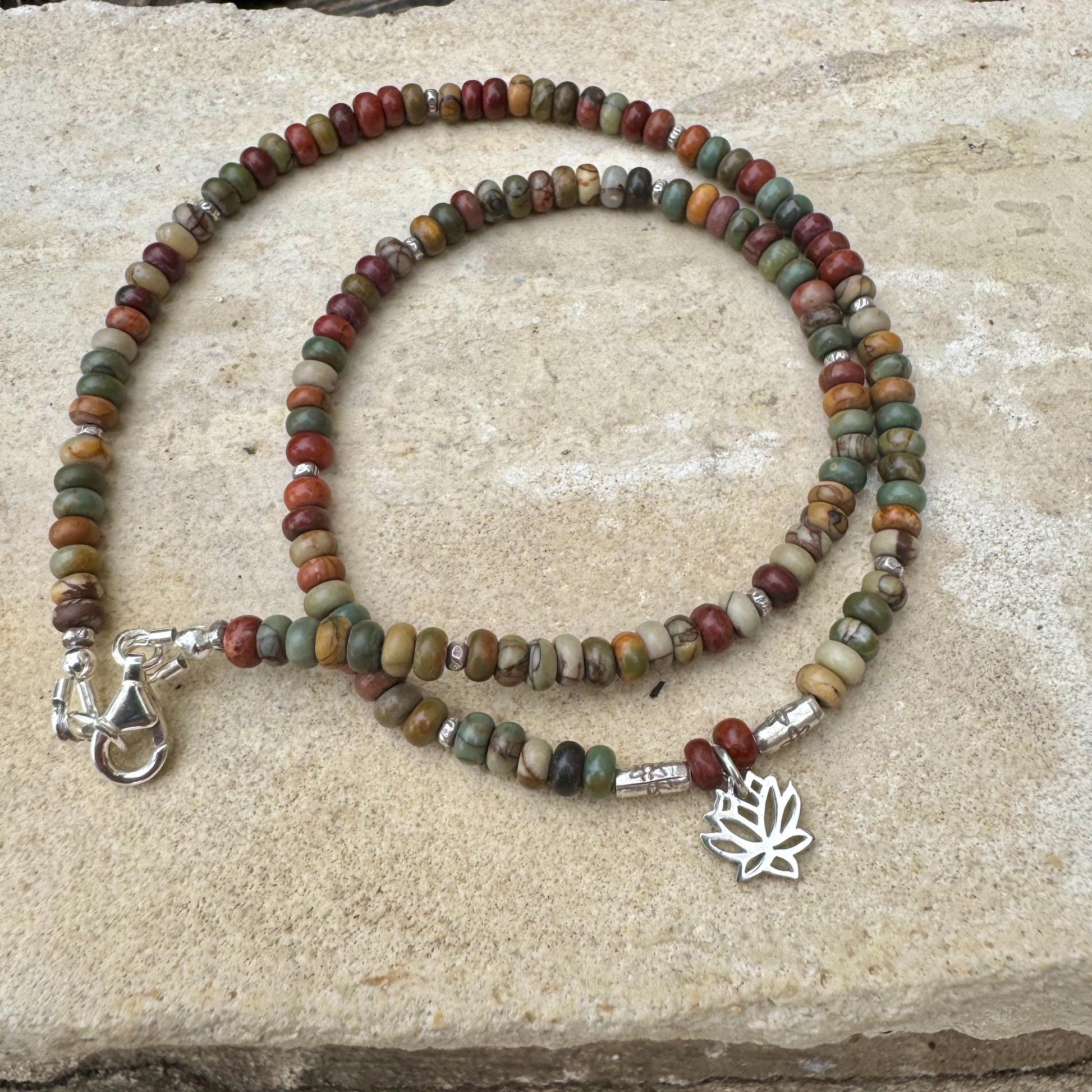 Picasso Red Creek Jasper gemstone necklace with sterling silver spacers and lotus flower pendant