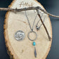 Royston Turquoise Sterling Silver Necklace: Circle Pendant with Feather Accent