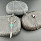 Royston Turquoise Sterling Silver Necklace: Circle Pendant with Feather Accent