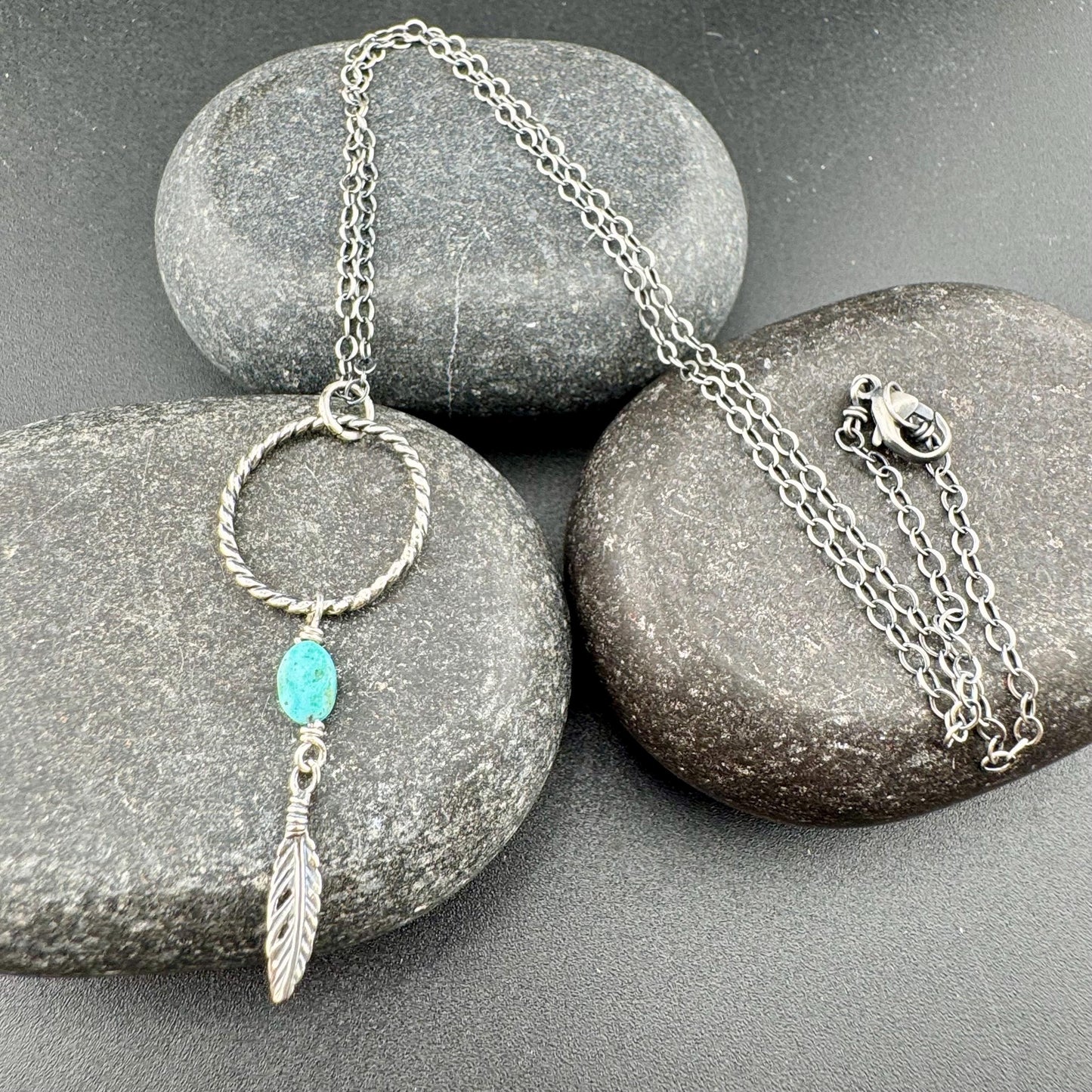 Royston Turquoise Sterling Silver Necklace: Circle Pendant with Feather Accent
