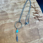 Royston Turquoise Sterling Silver Necklace: Circle Pendant with Feather Accent