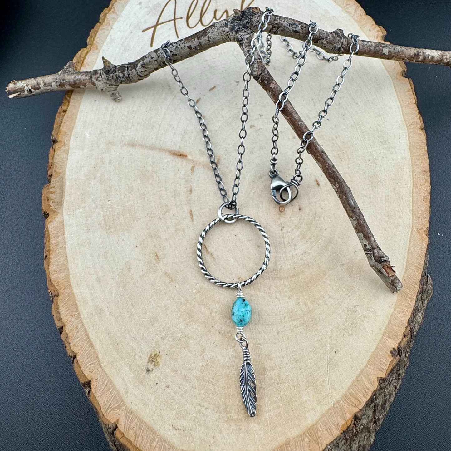 Royston Turquoise Sterling Silver Necklace: Circle Pendant with Feather Accent