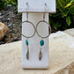 Elegant Royston Turquoise Sterling Silver Circle Earrings with Feather Accents