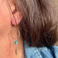 Elegant Royston Turquoise Sterling Silver Circle Earrings with Feather Accents