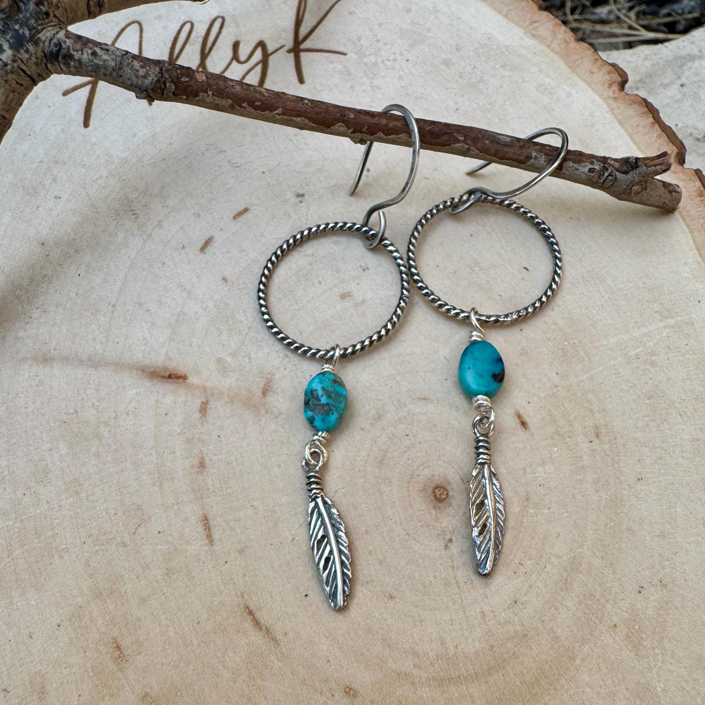 Elegant Royston Turquoise Sterling Silver Circle Earrings with Feather Accents