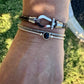 Leather bracelet with stainless steel horseshoe shackle