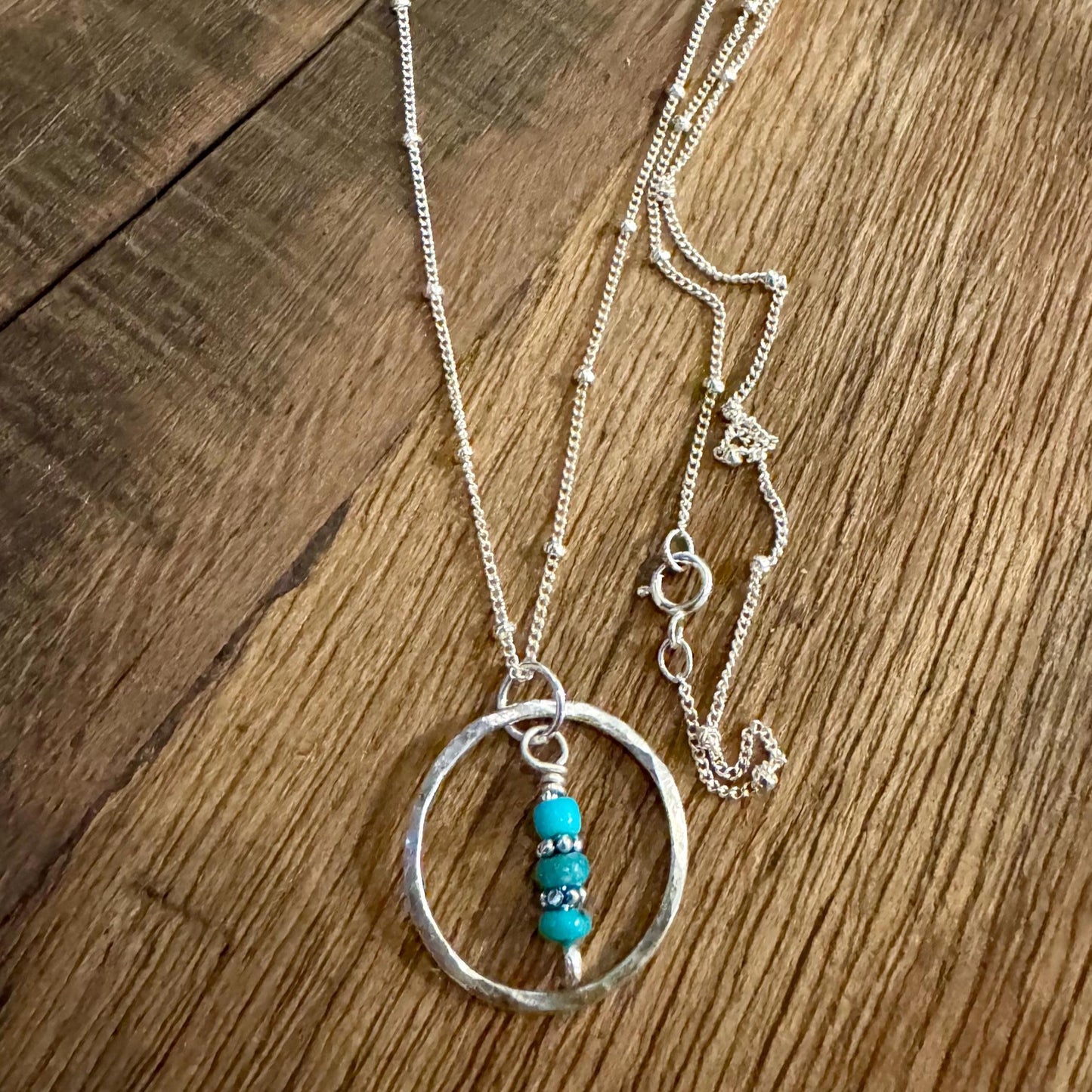 Arizona Turquoise Sterling Silver Necklace: Daisy Spacers, Circle Pendant