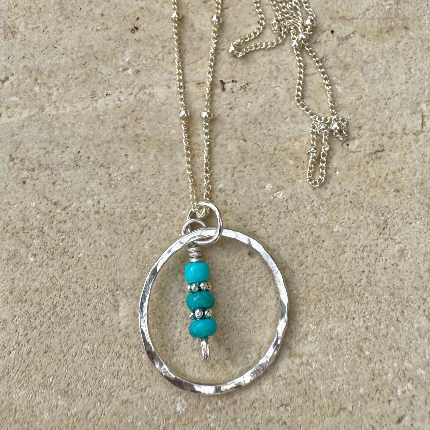 Arizona Turquoise Sterling Silver Necklace: Daisy Spacers, Circle Pendant