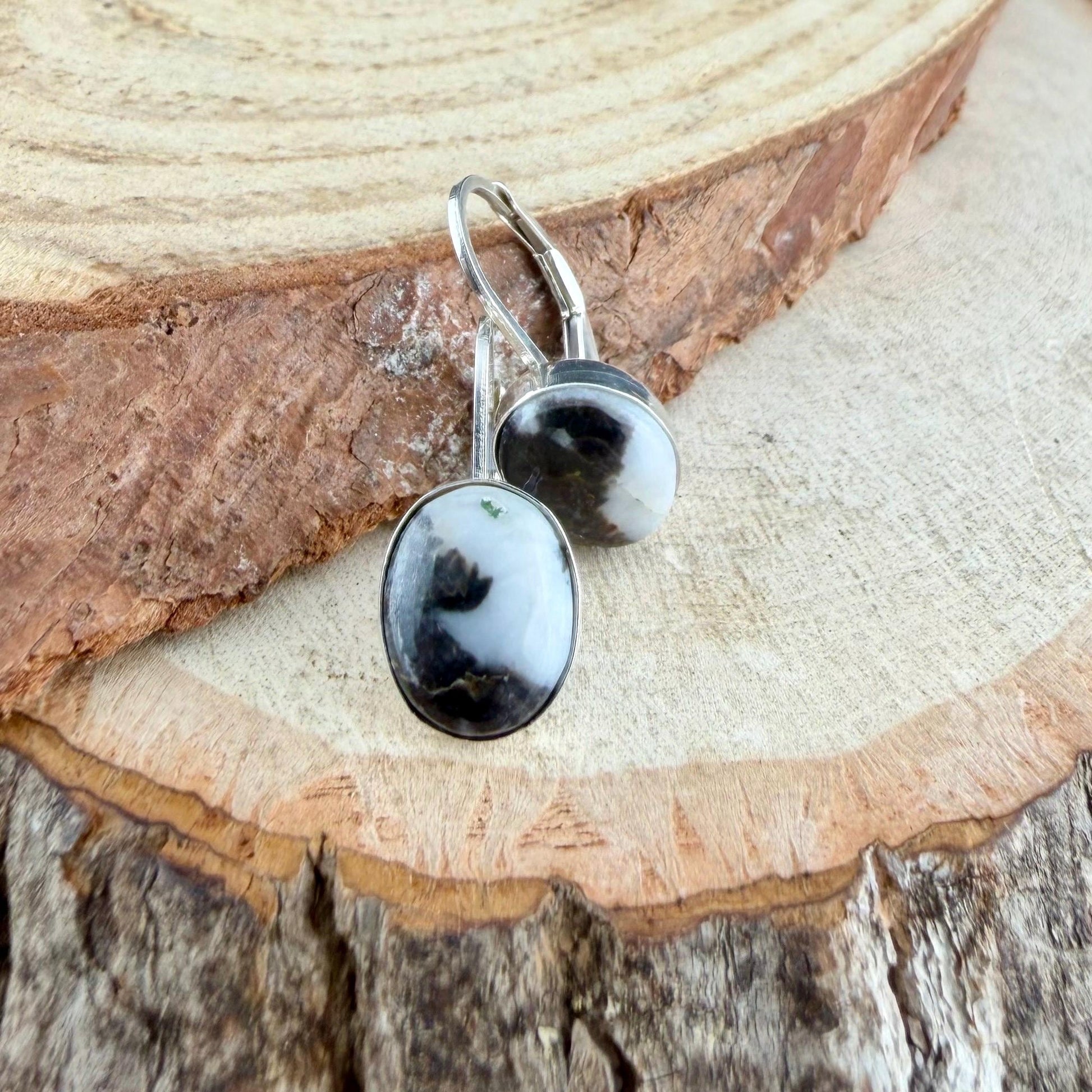 Sterling Lever-Back White Buffalo Earrings • 8x10 Oval Cabochon with Black-White Matrix