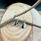 Sterling Lever-Back White Buffalo Earrings • 8x10 Oval Cabochon with Black-White Matrix
