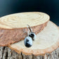 Sterling Lever-Back White Buffalo Earrings • 8x10 Oval Cabochon with Black-White Matrix