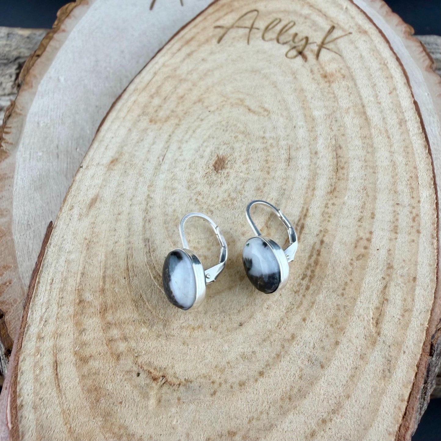 Sterling Lever-Back White Buffalo Earrings • 8x10 Oval Cabochon with Black-White Matrix