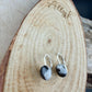 Sterling Lever-Back White Buffalo Earrings • 8x10 Oval Cabochon with Black-White Matrix
