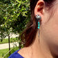 Scalloped Concho Turquoise Nugget Earrings • Sterling Silver • Feather Dangle